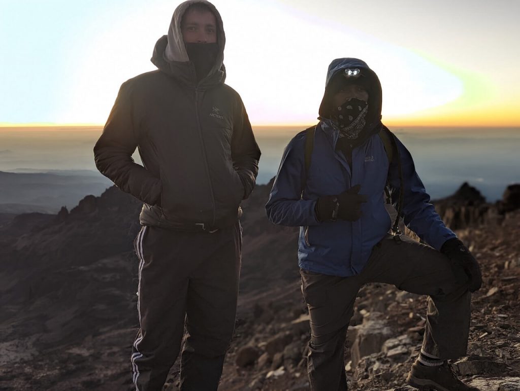 Abayo Albert and Nick Priestley climbing mt kenya